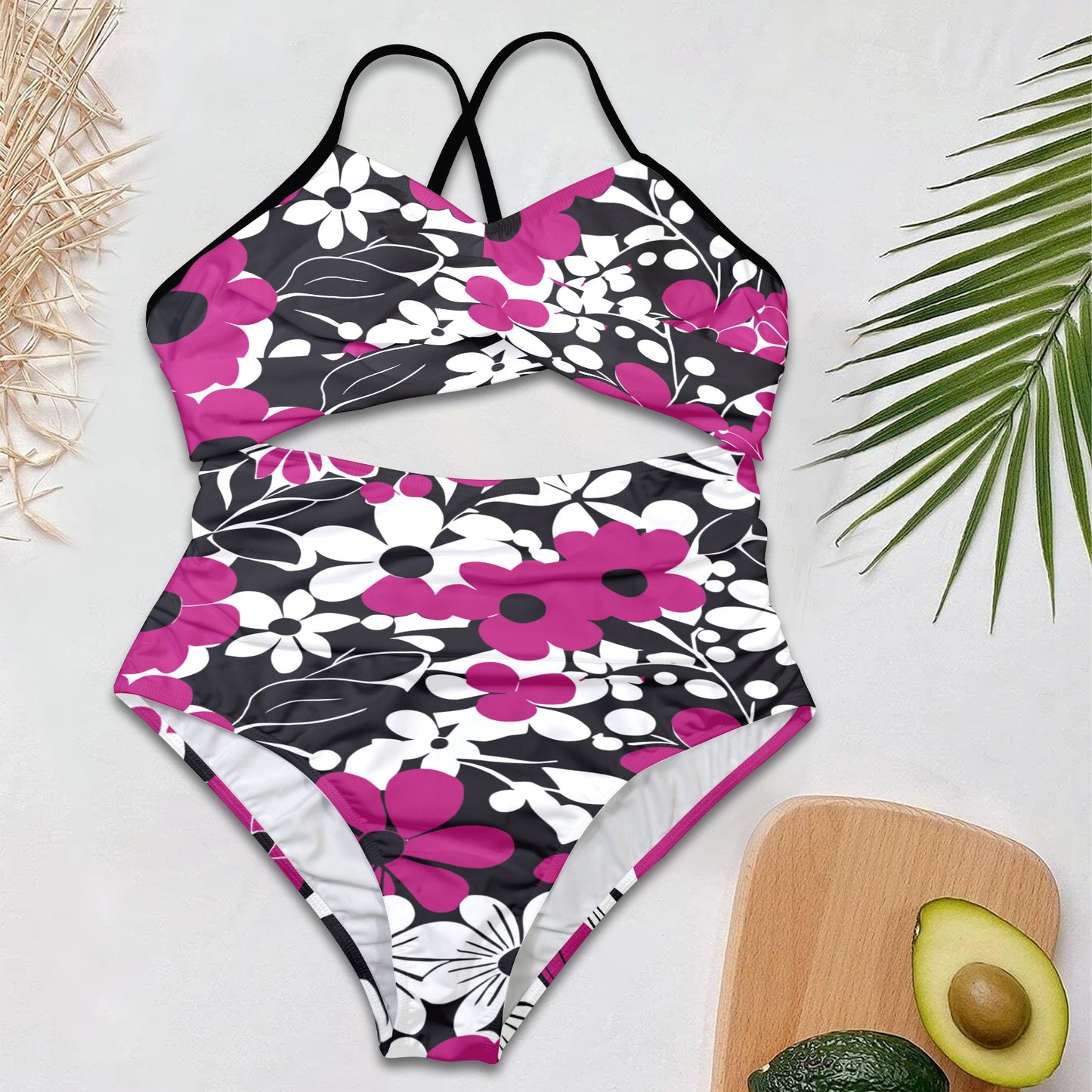 Flat lay of floral cut-out one-piece swimsuit