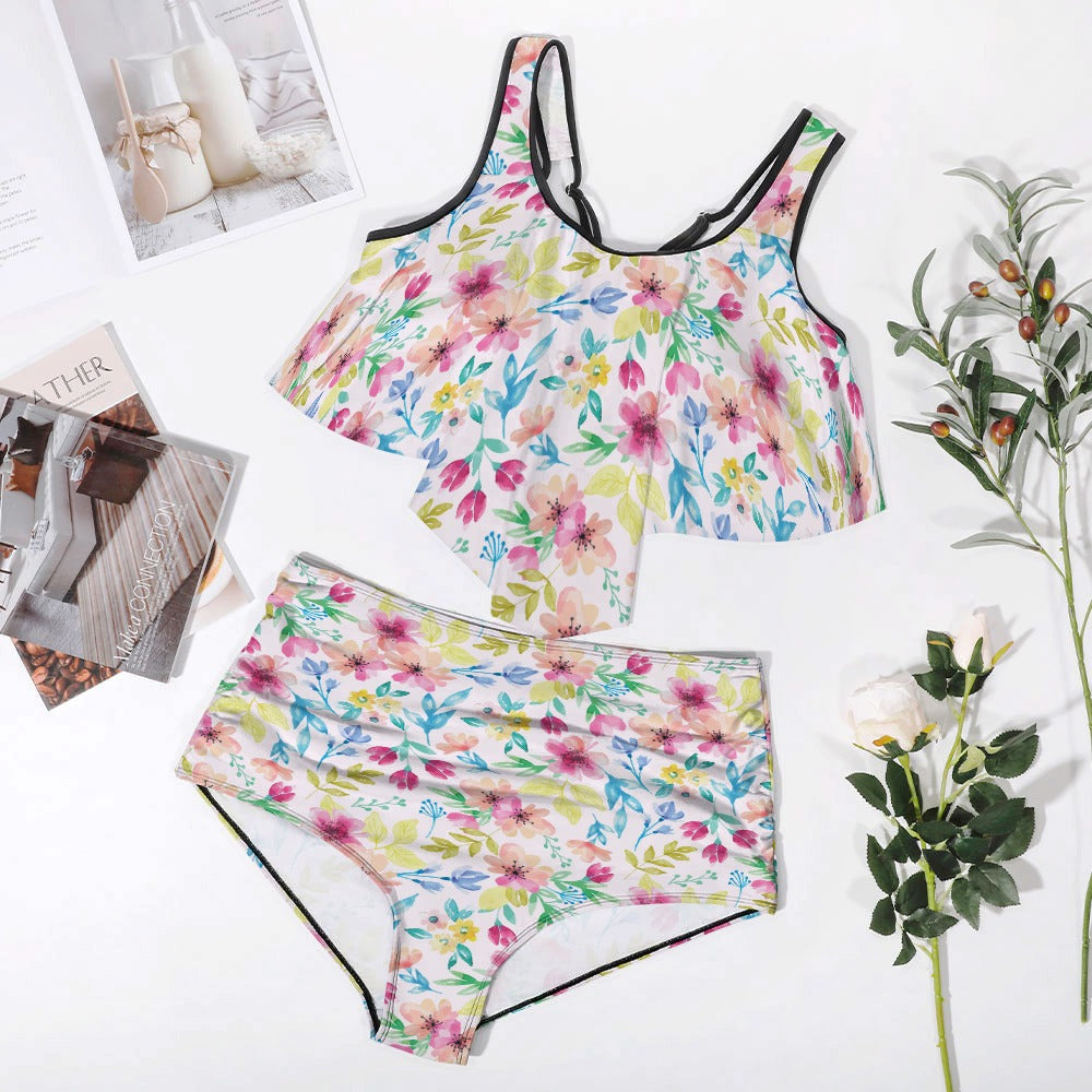Flat lay of plus size floral ruffle bikini set