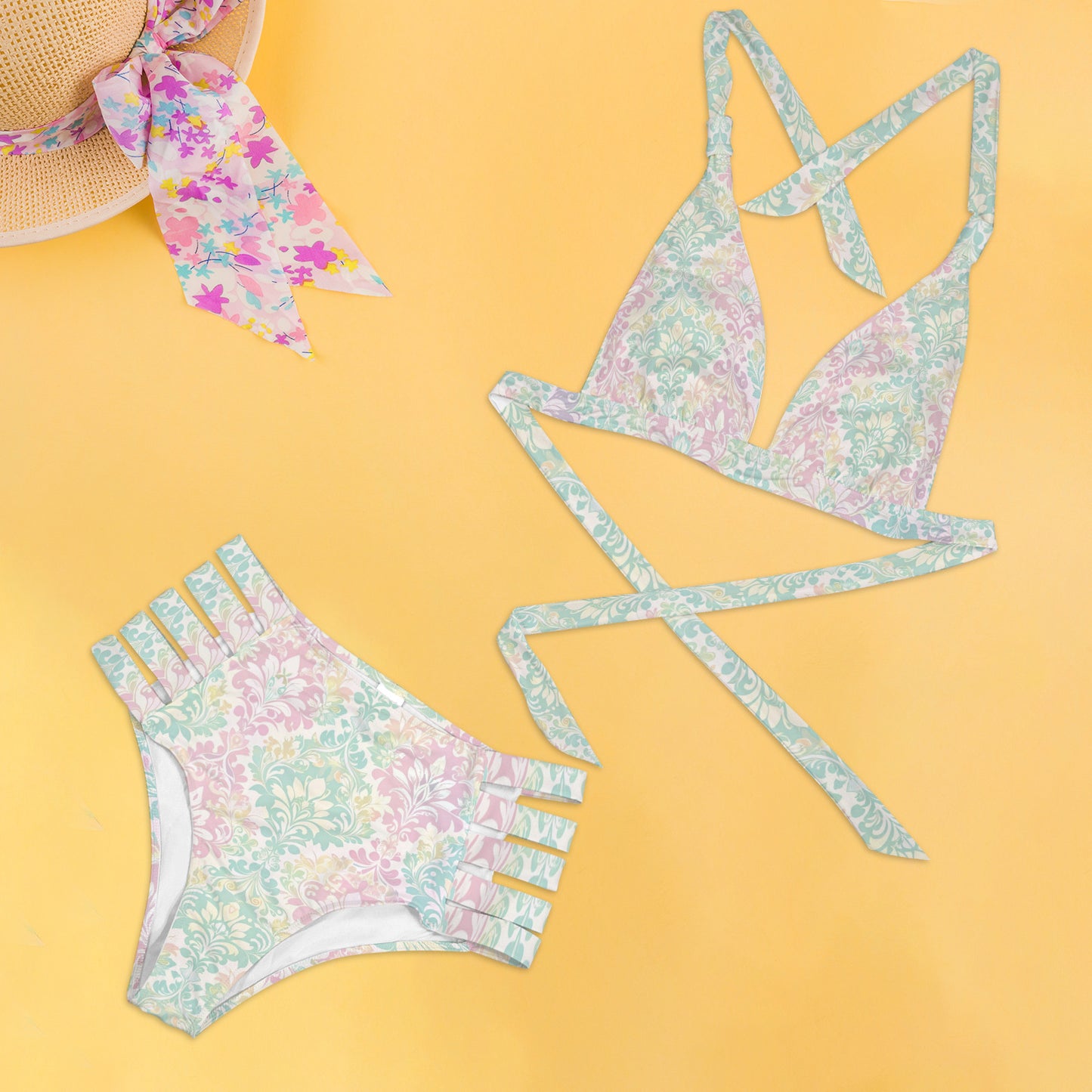 Flat lay pastel vintage bikini set with halter top and high waist bottom