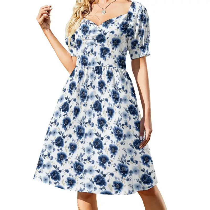 White and blue floral sweetheart dress with puff sleeves and knee-length skirt