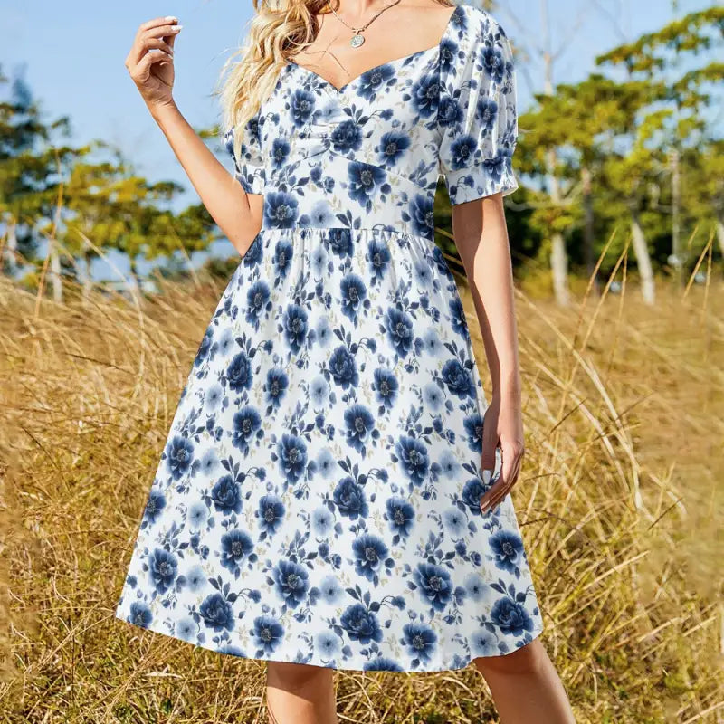 Blue floral sweetheart dress with puff sleeves and fitted waist for a cottagecore vibe