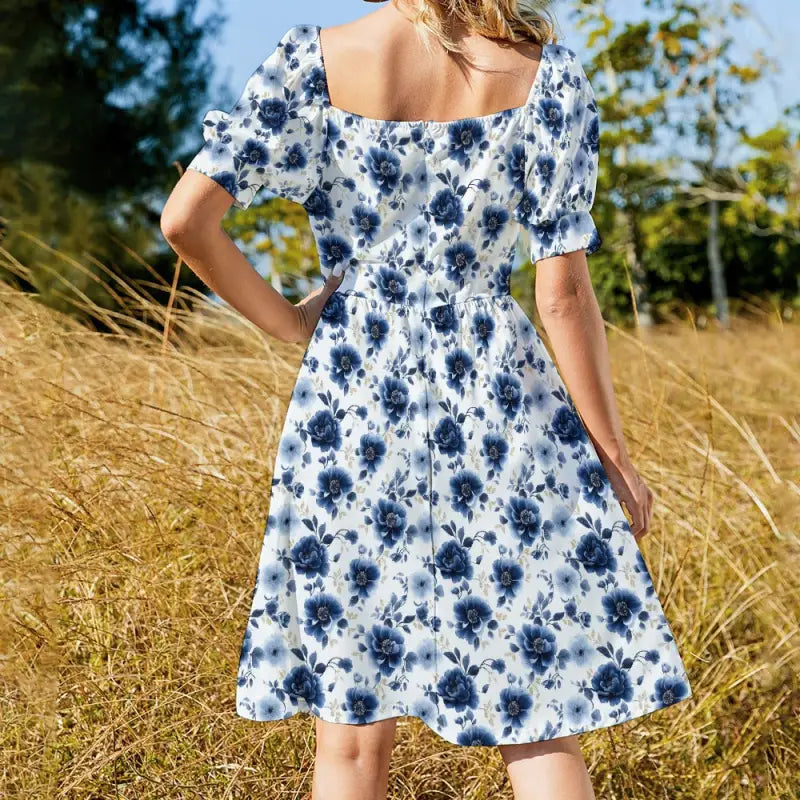 White and blue floral sweetheart dress with puff sleeves for a cottagecore vibe