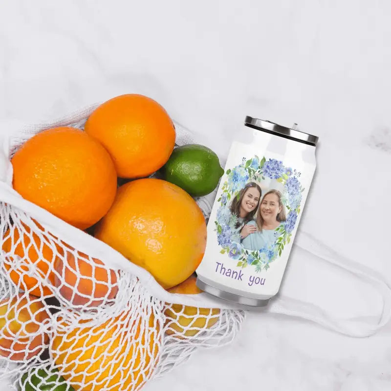 Reusable floral water bottle with Thank You message and citrus fruits in mesh bag