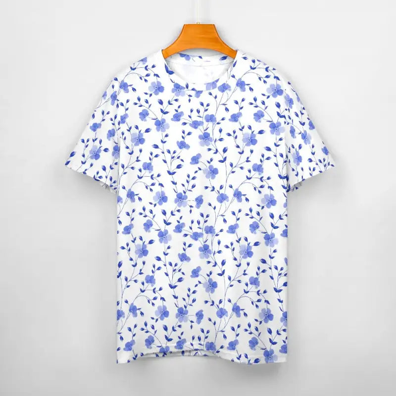Women’s blue floral short sleeve tee hanging on an orange hanger for a vibrant look