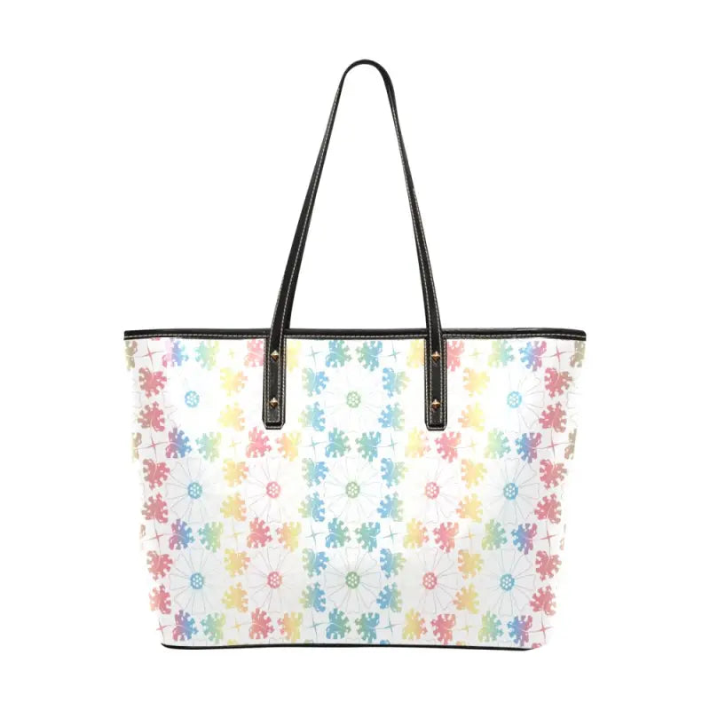 Floral shoulder tote with black leather handles and zipper pocket for easy access
