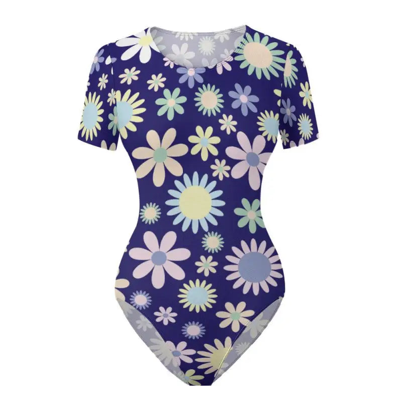 Blue floral short sleeve bodysuit with a vibrant floral pattern on navy background