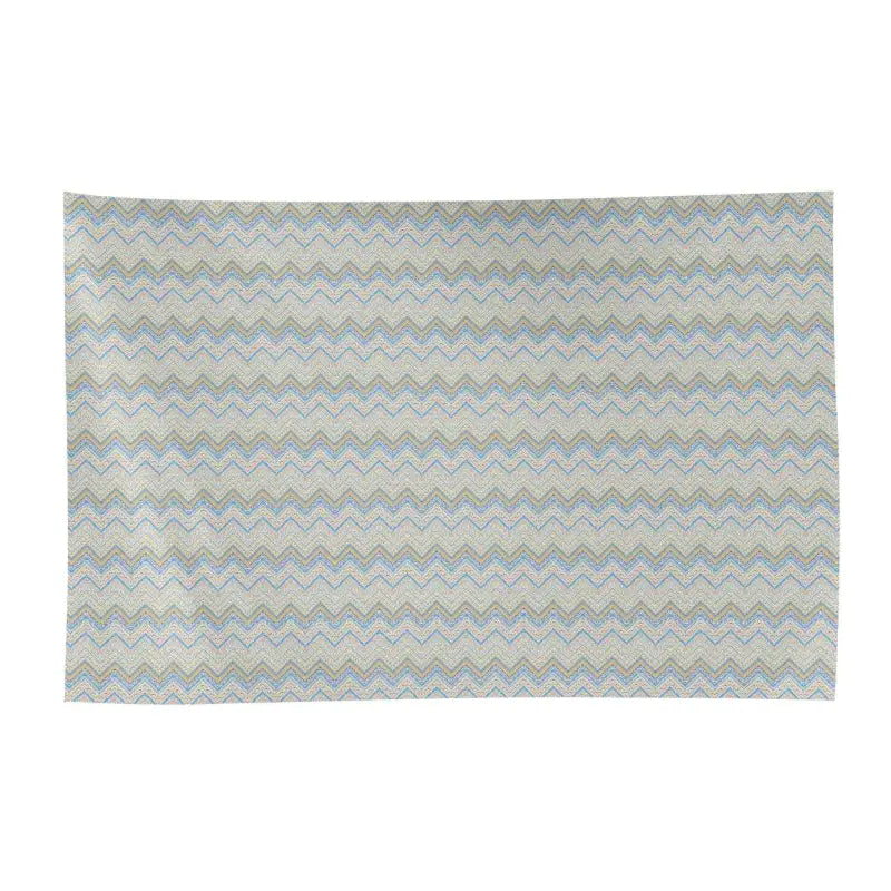 Rectangular rug with a chevron pattern in pastel colors for breezy beach vibes