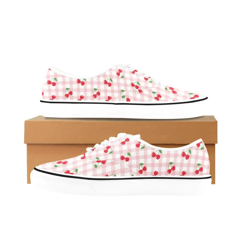 Cherry print canvas sneakers on a gingham background perfect for sweet summer vibes