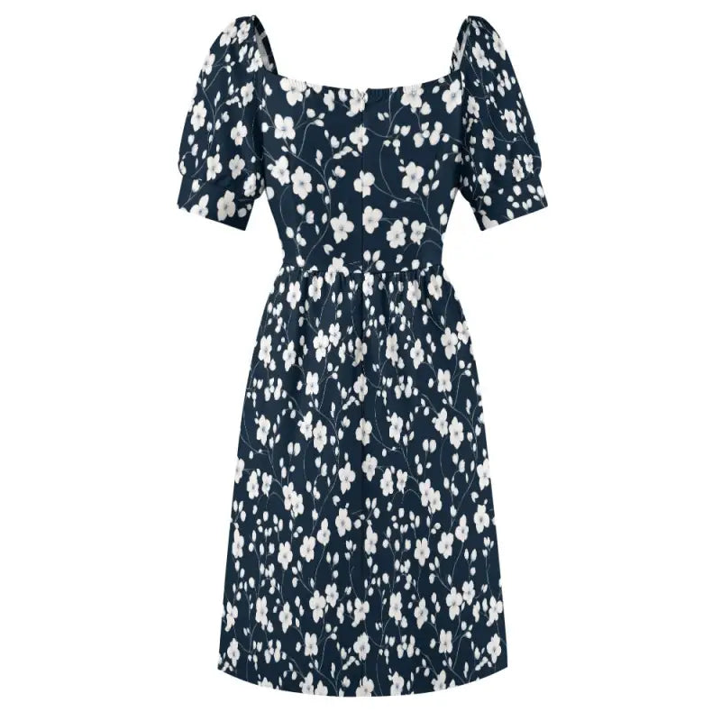 Floral sweetheart dress with puff sleeves on navy, featuring an enchanting floral design