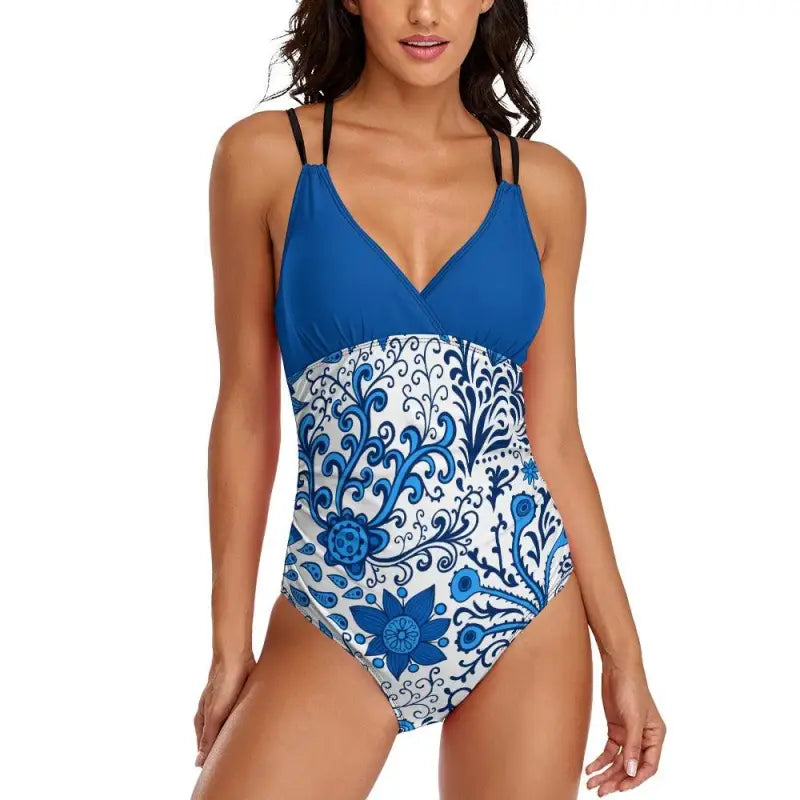 Blue floral one-piece swimsuit with thin straps and V-neckline for summer fun