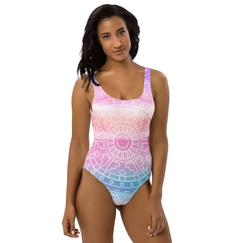 Colorful pastel mandala one-piece swimsuit in pink, white, and blue ombré design