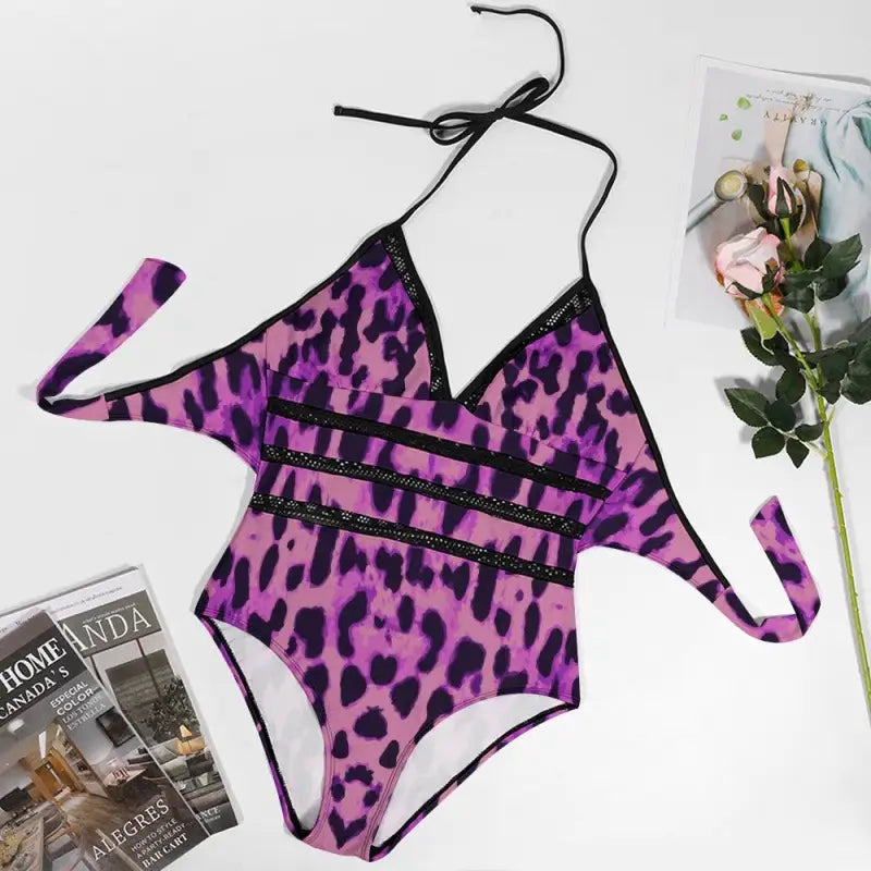 Purple leopard print one-piece lace insert swimsuit with chic black strappy details