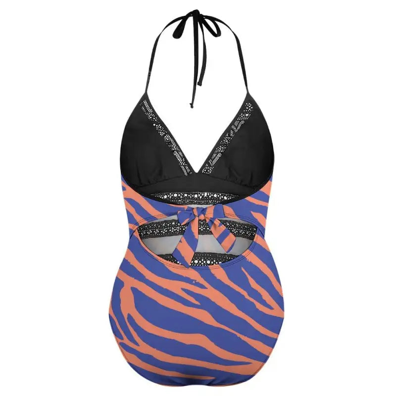 Halter-style lace insert swimsuit with black top and blue-orange zebra print bottom