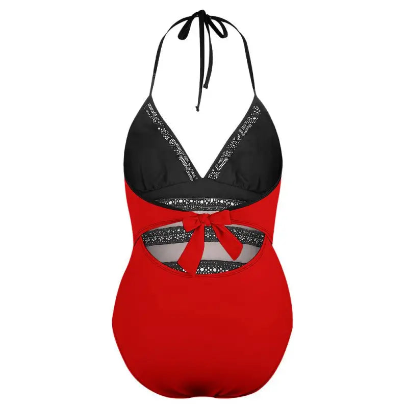 Red and black one-piece swimsuit with lace inset tie details for a stylish beach day