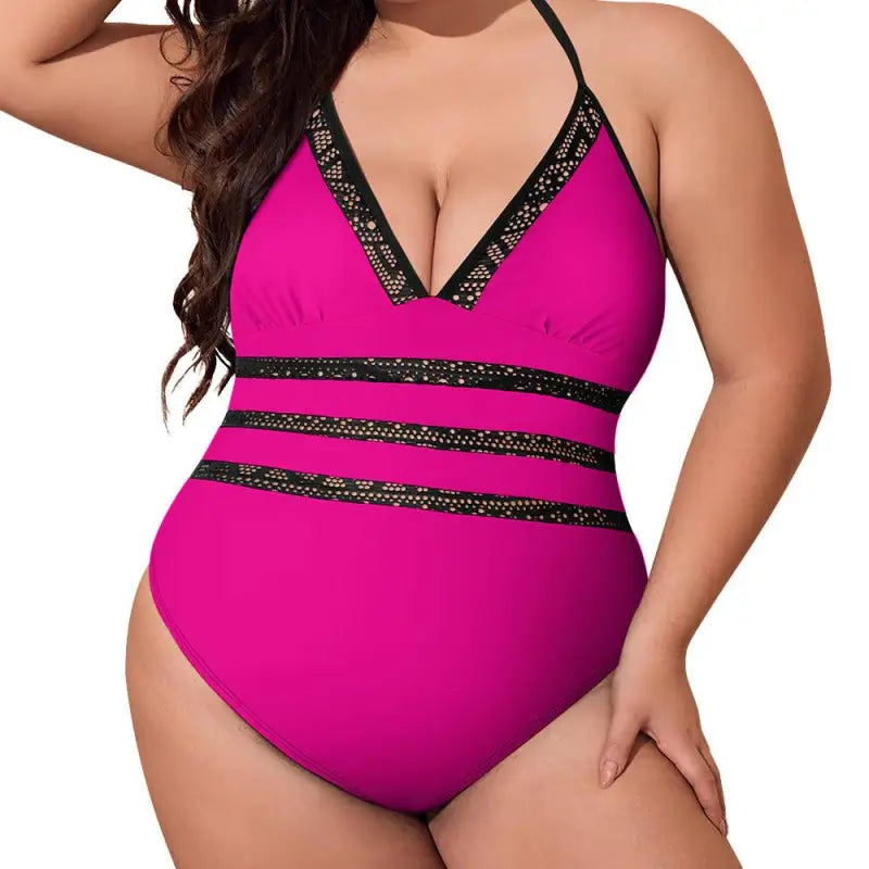 Bright pink one-piece swimsuit with black trim and lace inset tie for beach fun