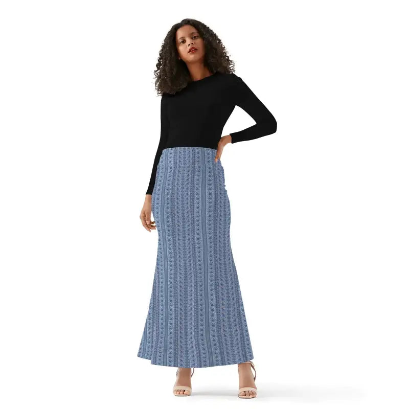 Woman flaunting a stylish black top with a stunning blue boho maxi skirt