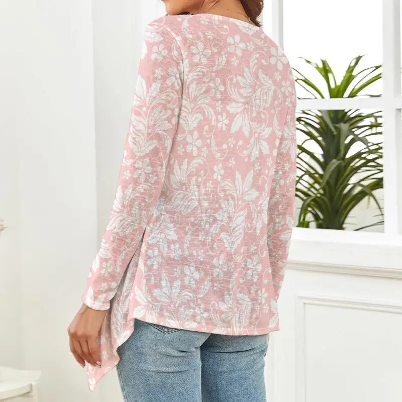 Pink and white floral patterned long-sleeved top for a relaxed, stylish women’s look