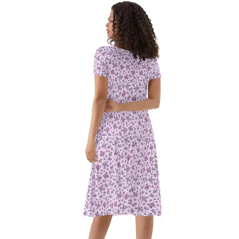 Womens purple floral short sleeve ruffle dress with a lovely knee-length skirt