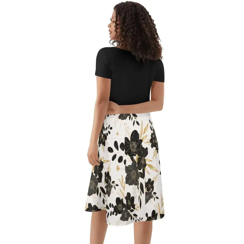 Floral print A-line skirt and black crop top for a cute ruffle summer dress look