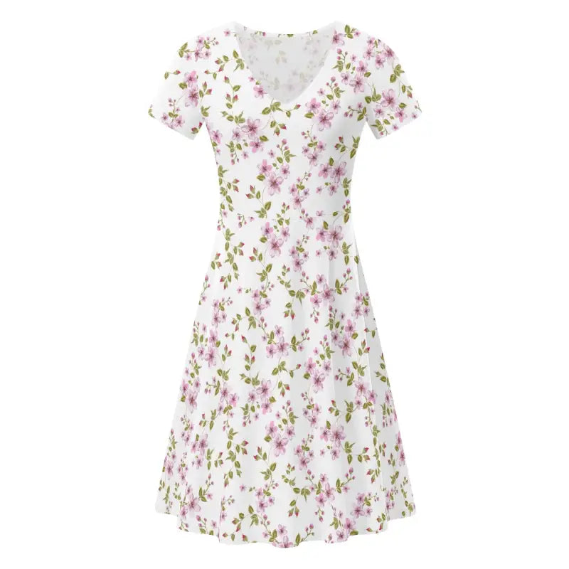 Purple floral summer dress with a V-neckline and fitted waist for a garden party vibe