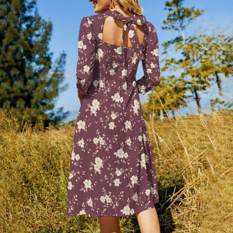 Floral Sweetheart Dress in purple with long sleeves and back cutout, perfect for spring