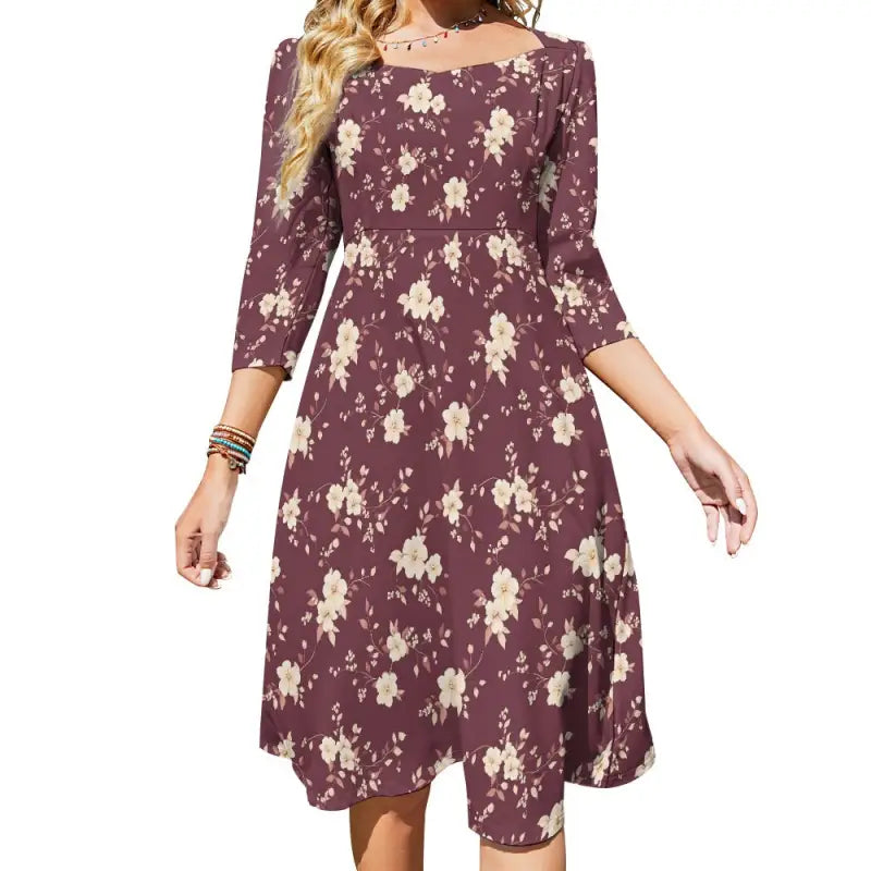 Burgundy floral sweetheart dress with three-quarter sleeves, perfect for spring style