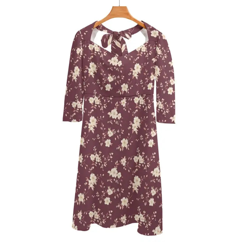 Burgundy Floral Sweetheart Dress on a hanger, perfect for spring vibes and style