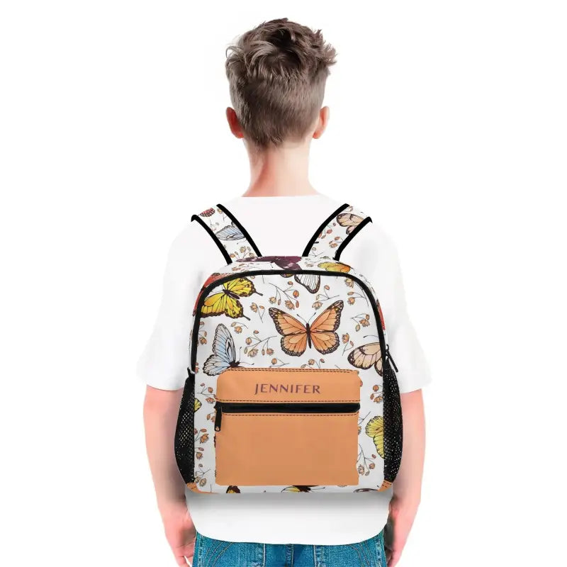 Personalized butterfly mini backpack with floral design and front pocket labeled JENNIFER