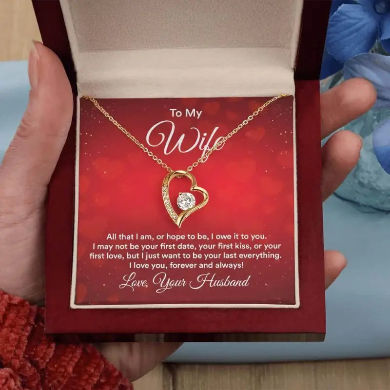 Gold heart-shaped pendant necklace with diamond in red box for Forever Love Necklace