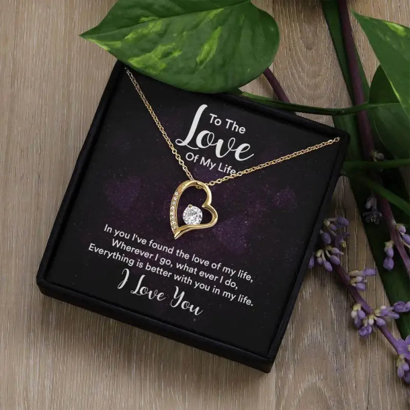Gold heart-shaped Forever Love Necklace with diamond in gift box for romantic moments