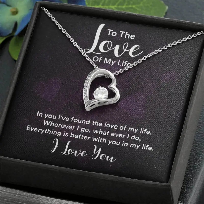 Heart-shaped pendant with diamond accent on a silver chain for the Forever Love Necklace