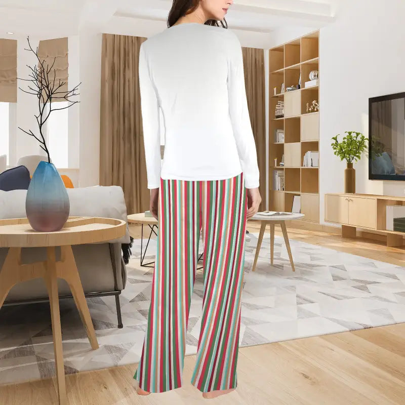 Striped wide-leg pants and a white top in cute Christmas pajamas for holiday fun
