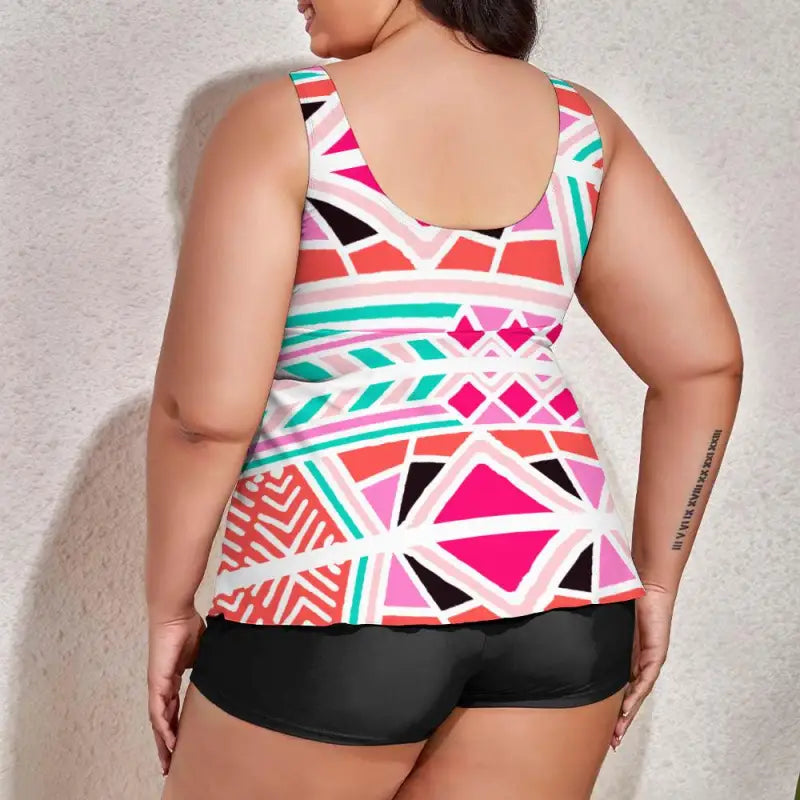 Colorful geometric abstract print tankini paired with stylish black shorts