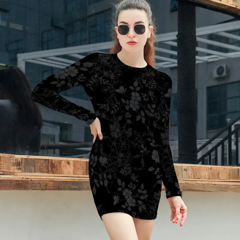 Black bodycon mini dress that’s elegant long sleeve and perfect for a chic night out