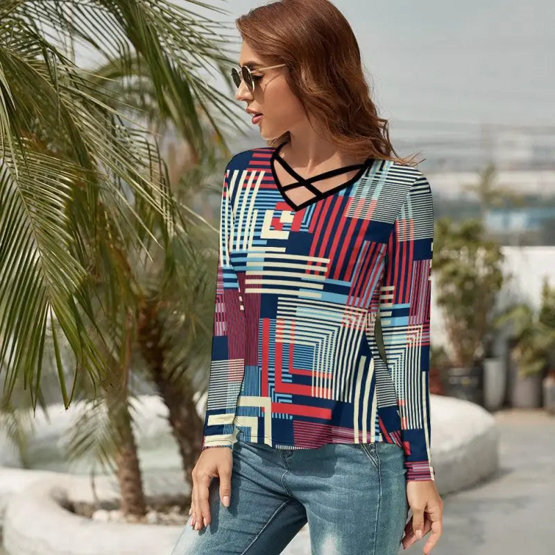 Colorful geometric print v-neck long-sleeved top with criss-cross neckline