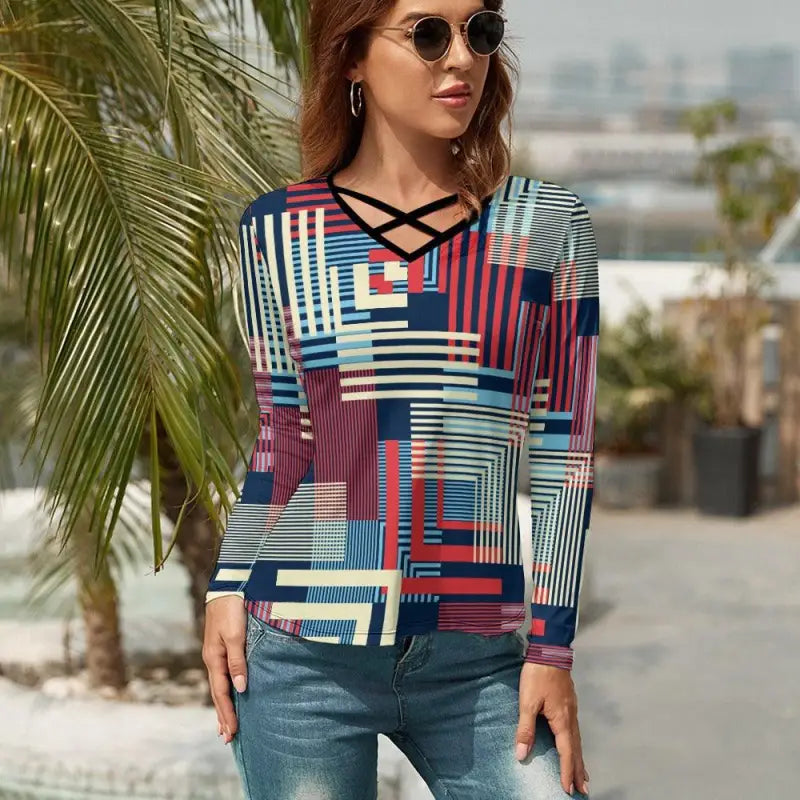 Colorful geometric print v-neck long-sleeved top with trendy criss-cross design