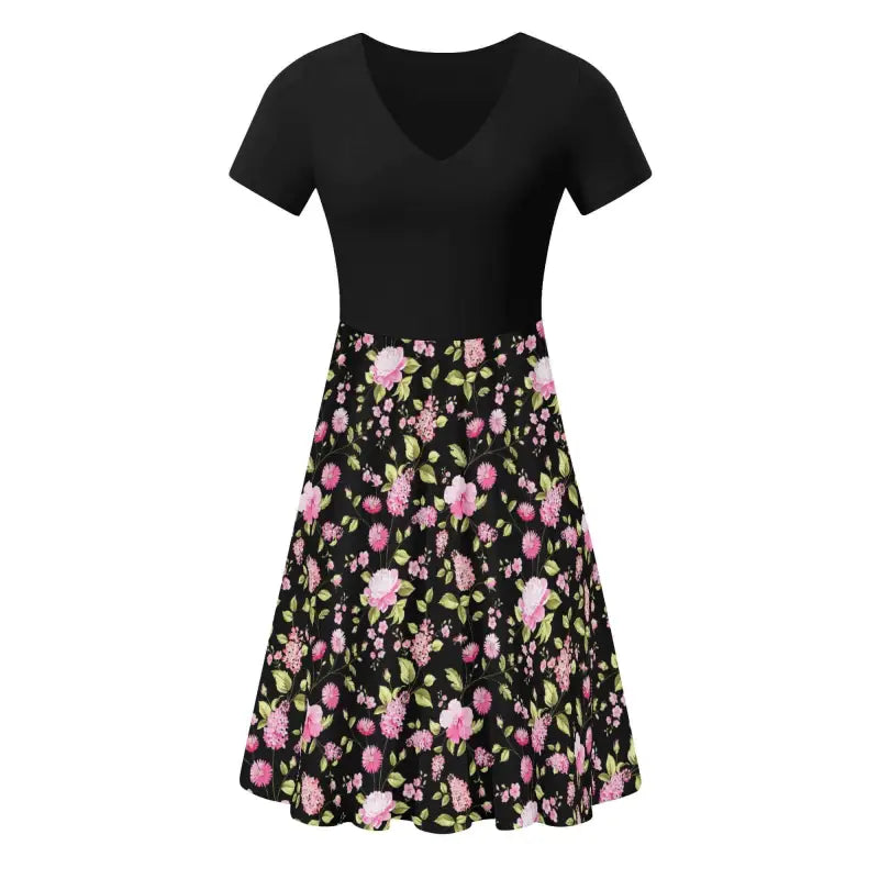 Short-sleeved floral swing dress featuring a black top and a vibrant floral skirt