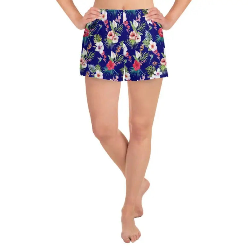 Blue tropical floral women’s shorts with a vibrant pattern on navy blue background