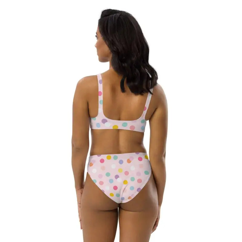Get your groove on in this pink polka dot sport bikini with colorful dots design