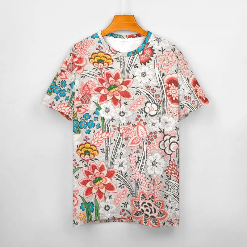 Colorful cotton floral print short sleeve t-shirt with vibrant pink, blue, and yellow flowers