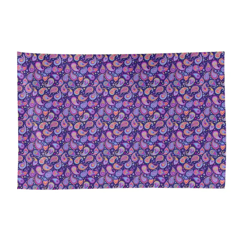Vibrant purple paisley sarong wrap with swirls of pink and blue patterns