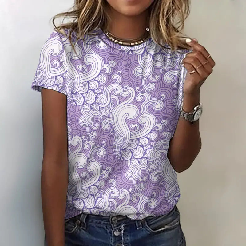 Women’s purple swirl print cotton t-shirt with a fun heart design, perfect for any vibe