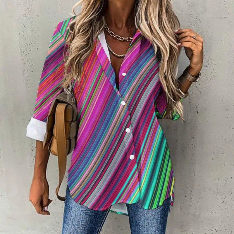 Colorful oversized women’s striped button shirt with vibrant pink, blue, and green lines