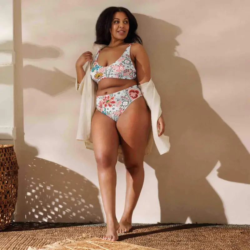 Woman rocking a Retro Floral High-Waisted Bikini with a stylish white cover-up