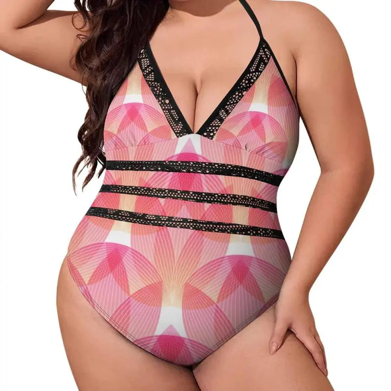 Pink geometric print swimsuit with black trim and halter neck for stylish summer fun