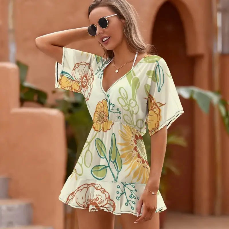 Ladies yellow floral short sleeve mini dress perfect for sunny party vibes