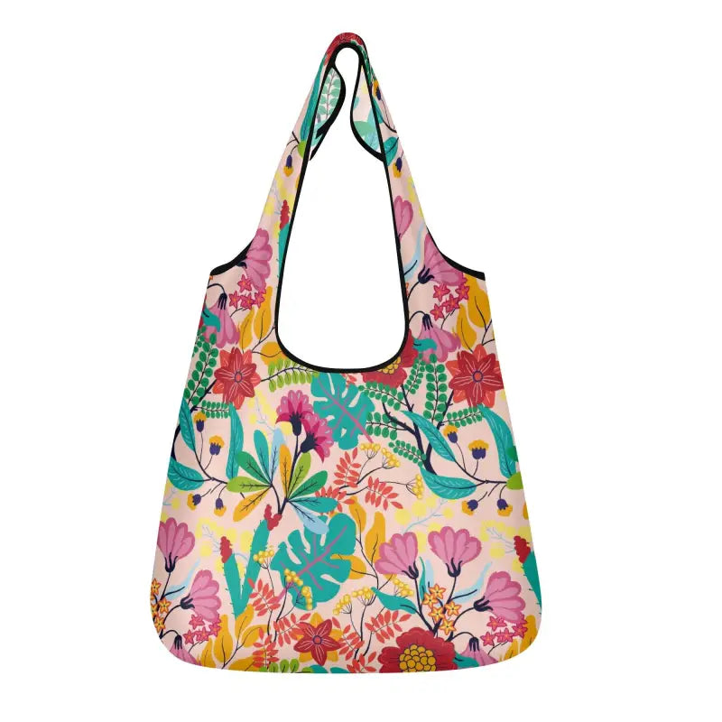 Colorful reusable shopping tote bag with floral print for eco-friendly grocery trips