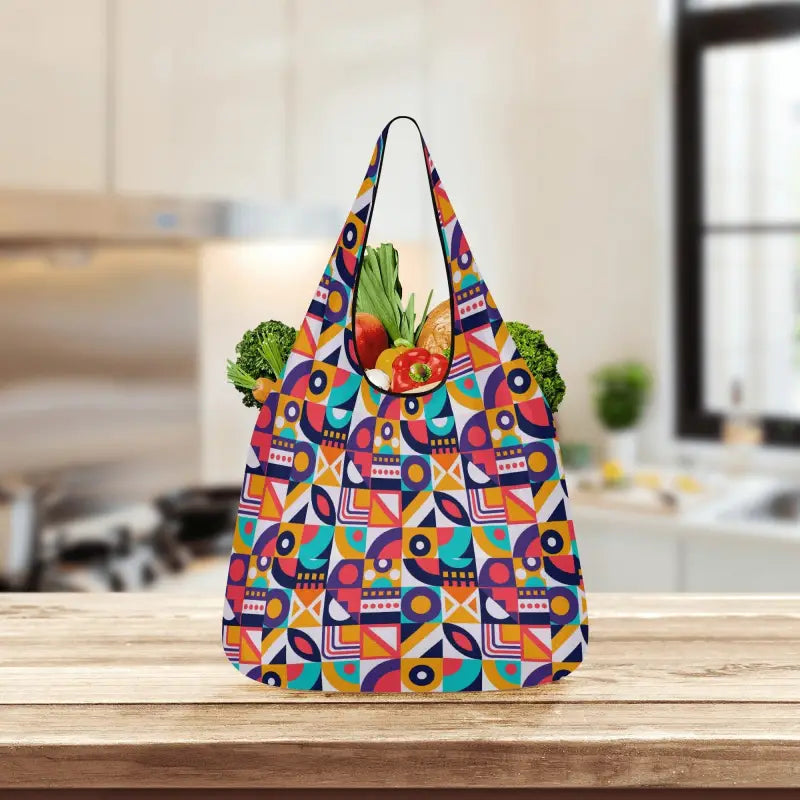 Colorful geometric print grocery bags filled with fresh produce for a fun shopping trip