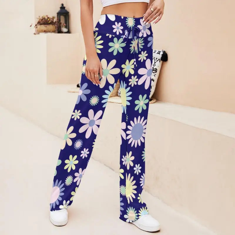 Blue floral straight pants with vibrant daisy designs for a playful, colorful lift