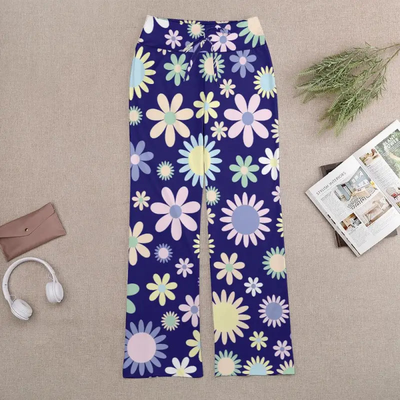 Floral print pants with navy blue background and pastel daisy designs, perfect for a lively look